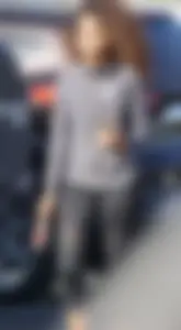 Beautiful black girl in Nike leggings in the parking lot