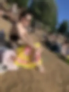 Candid milf sitting on the beach