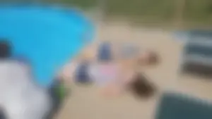 Couple of Young Girls in Jean Mini Shorts on the Backyard Pool