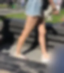 Girl in Denim Shorts with Amazing Hot Legs Fixing Her Sandals Street Candid Photo Gallery