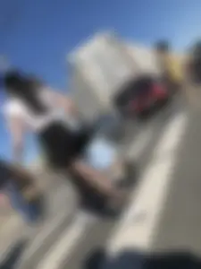 Skinny candid teen wearing shorts and black pantyhose crossing the street