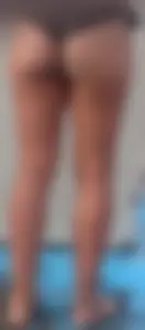 Beach shower milf in semi thong bikini with a nice ass