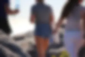Sexy tourist in short jean shorts showing cheeks