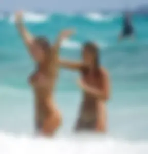 Nude and almost naked girls at the beach