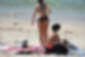 Sexy ass girl with a perfect body in her bikini on the beach