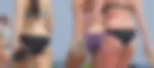 3 sexy girls with nice asses walking on the beach in bikinis
