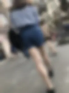 Candid teen in denim shorts