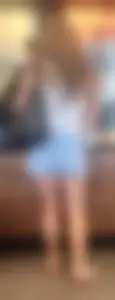 Short shorts on hot milf buying coffee