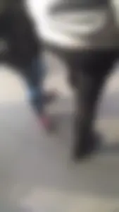 Girl wearing a black skirt over her leggings