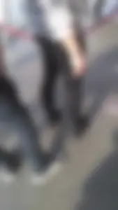 Girl wearing a black skirt over her leggings