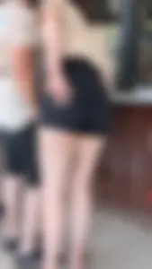 Tall brunette in short black jean. oc