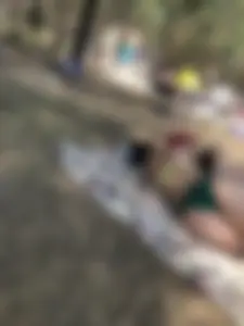 Girl in Swimsuit With Hot Ass Lying on a Towel at a Nature Park Creepshots