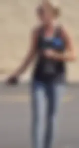 Skinny blonde in grey leggings with a friend