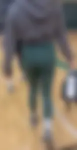 Tiny Asian leaving the gym in green leggings