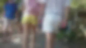 Milf in yellow shorts with vpl and a wedgie