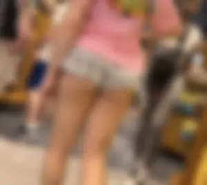Petite light skin Latina with ass hanging out of skirty shorts