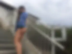 Blue thong beach babe walking up the stairs