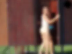 Hot chick with a nice ass at the pool in a white see through thong
