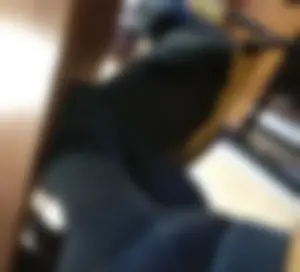 Legs in Black Leggings Under Table Classroom Creepshot