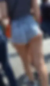 Thick booty babe in denim shorts showing her cheeks