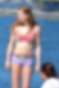 Beauty at the beach in booty short bikini