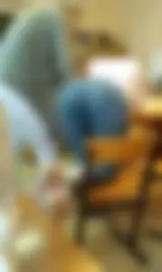 College Girl in Tight Blue Jeans Standing on Her Knees on the Chair Bending Over Desk - Sort of Doggy Style