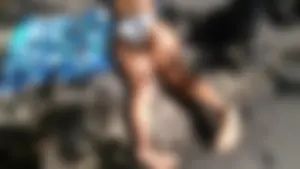 Sexy bikini ass laying out on the rocks up close