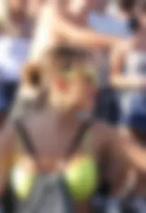 Boobs out in public in either bikini tops or bras