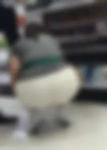 Amazing Asian in white yoga shorts upshot bends squat at Target