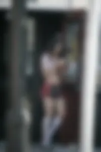 Two sexy Tilted Kilt employees showing cleavage and cheeks