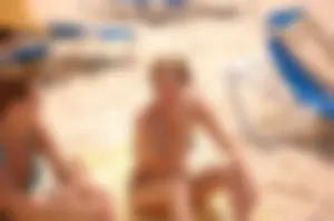 Assortment of sexy babes at the beach in bikinis