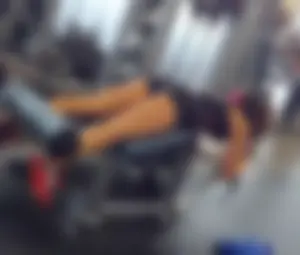 Muscular Girl Working Out in a Gym Sexy Creepshot - Mini Spandex Shorts