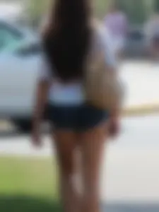 Denim short babe with a wedgie showing some cheeks