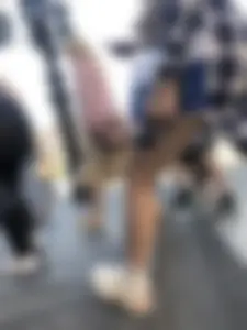 Nice legs of a candid girl crossing the street