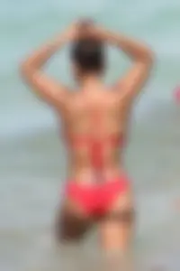 Christina Milian in red bikini in Miami with hard nipples
