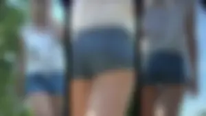 Couple cute blonde teens in short jean shorts showing some cheeks