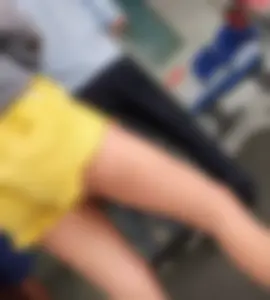 Skinny ass eating her yellow shorts