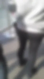 Girl wearing a black skirt over her leggings