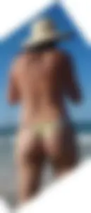 Cute girl on the beach with a decent body in thong bikini