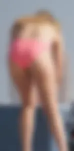 Thick blonde bikini babe on the beach