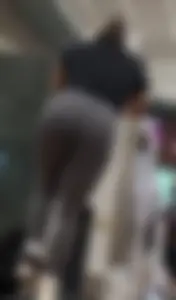BIG BOOTY BRUNETTE touching her toes in Grey LuLus at gym