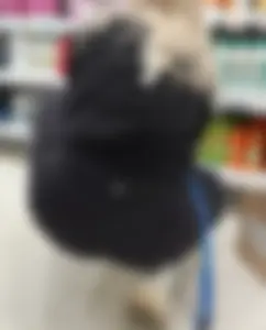 Blonde squatting with nice ass packed in leggings