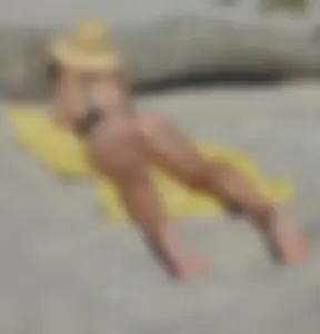 Milf Lying on the Beach in Swimsuit Creepshot
