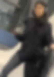 Tight curvy latina at airport pulls up pants