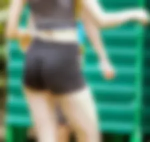 Blonde with Skinny Ass in Spandex Shorts and a Top Candid