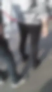 Girl wearing a black skirt over her leggings
