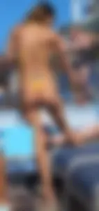 Fake tits in a bikini