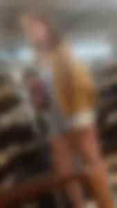Cute girl showing cheeks off at the thrift shop