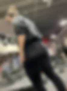 Thick booty working out at the gym in black leggings