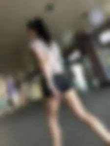 Awesome candid chick wearing mini shorts, perfect long pale legs